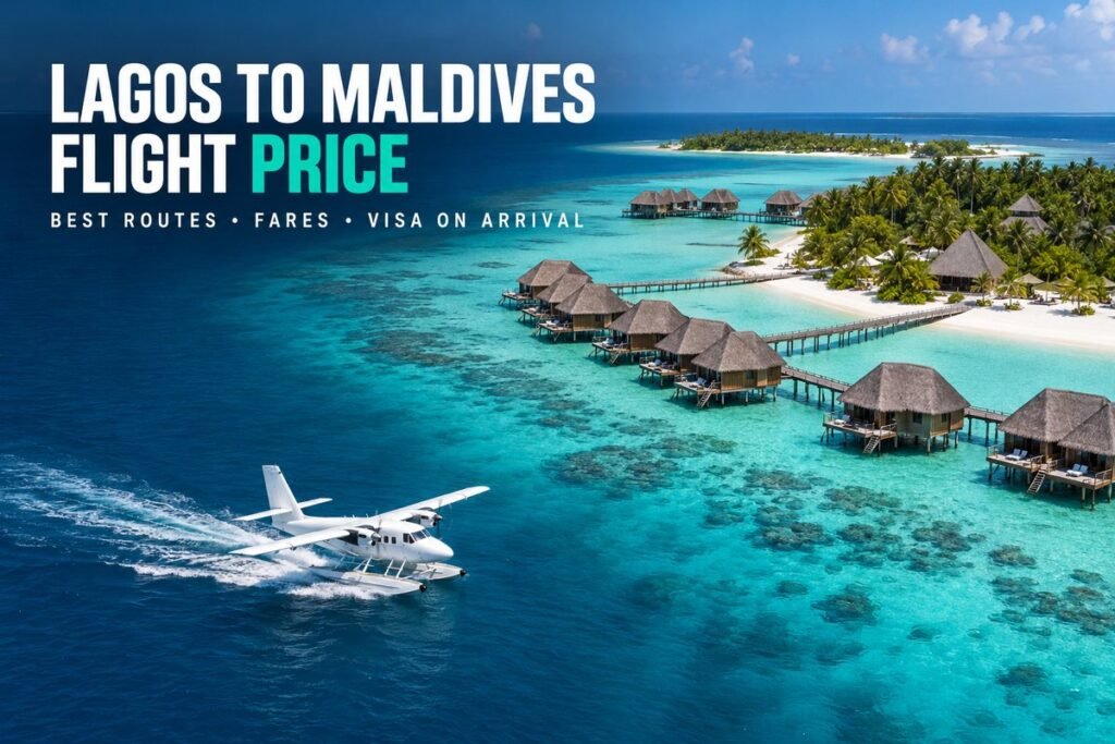 Seaplane parked at a wooden jetty beside a turquoise lagoon in the Maldives with white sand and palm trees